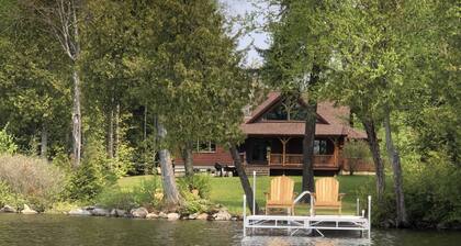 Beautiful, Peaceful Lakefront Home in woods. Canoe, Kayaks, ATV trail access.