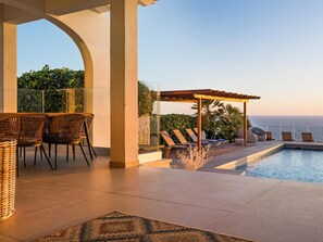 Outdoor pool, a heated pool, sun loungers