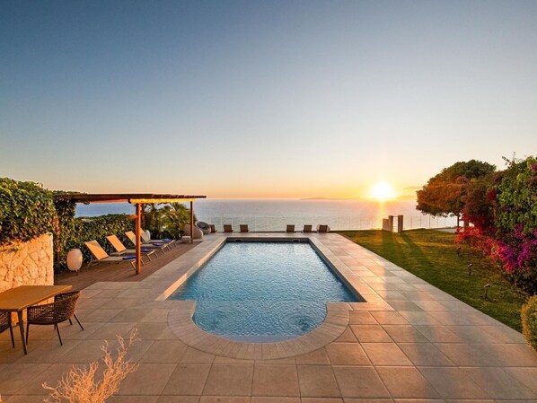 Outdoor pool, a heated pool, pool loungers