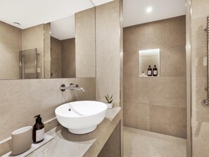 Hair dryer, towels, soap, shampoo