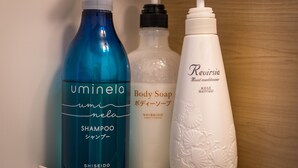 Three bottles of personal care products: a blue shampoo bottle, a clear body soap bottle, and a white conditioner bottle. - Comfort Inn Kyoto (Kyoto)