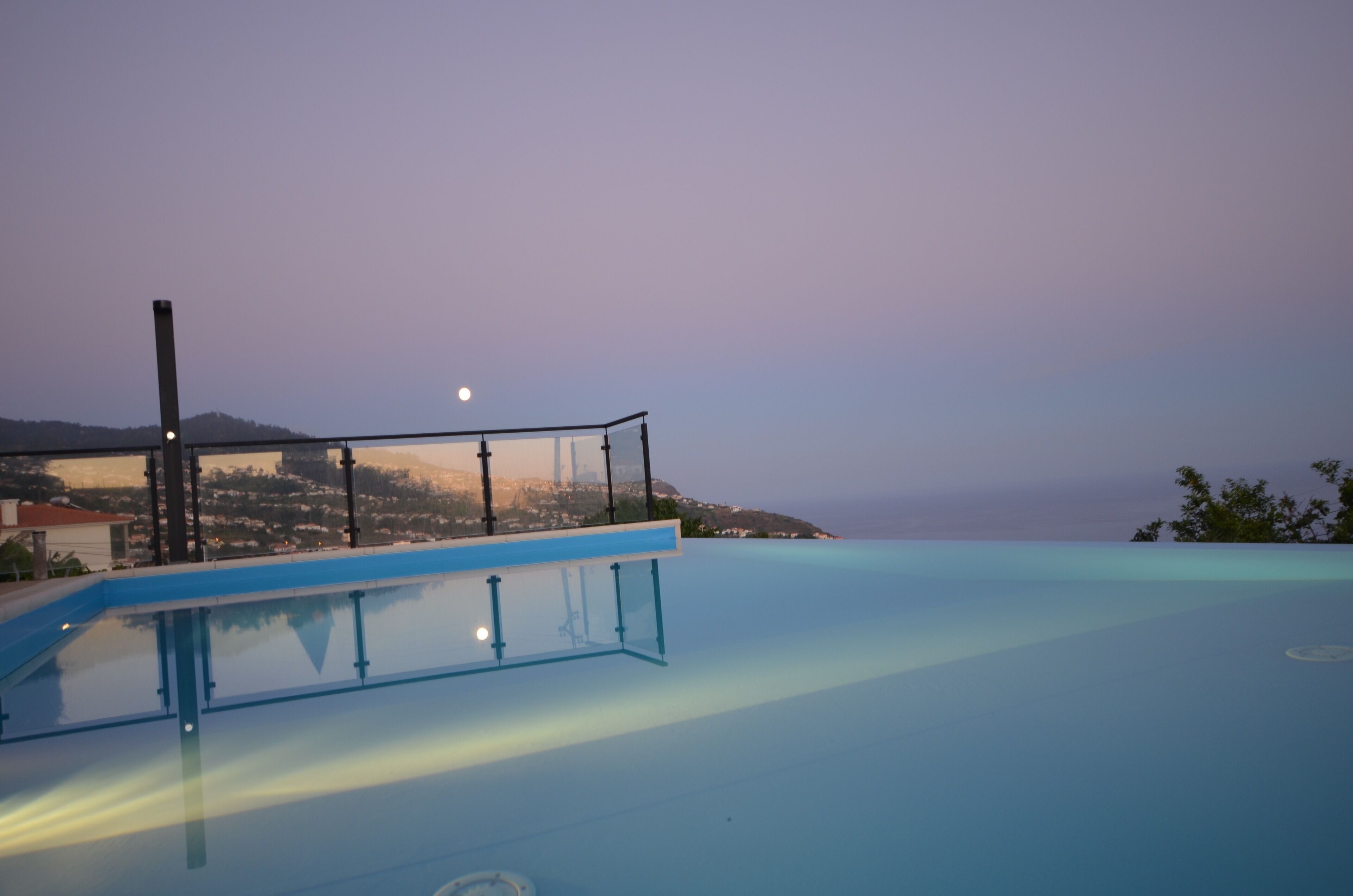 Outdoor pool, an infinity pool, sun loungers