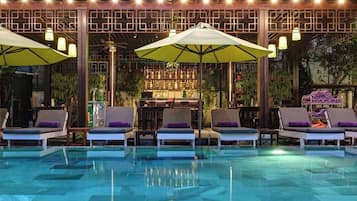 Outdoor pool, open 6 AM to 7:00 PM, pool umbrellas, pool loungers