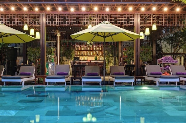 Outdoor pool, open 6 AM to 7:00 PM, pool umbrellas, sun loungers