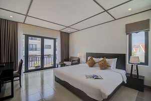 Premium bedding, down duvets, Select Comfort beds, minibar