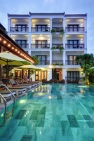 Outdoor pool, open 6 AM to 7:00 PM, pool umbrellas, pool loungers