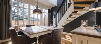 Exclusive apartment with daily. Cleaning, fireplace, water views, laundry incl.