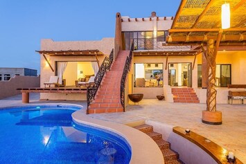 Balcony of master suite overlooking the pool and beach.