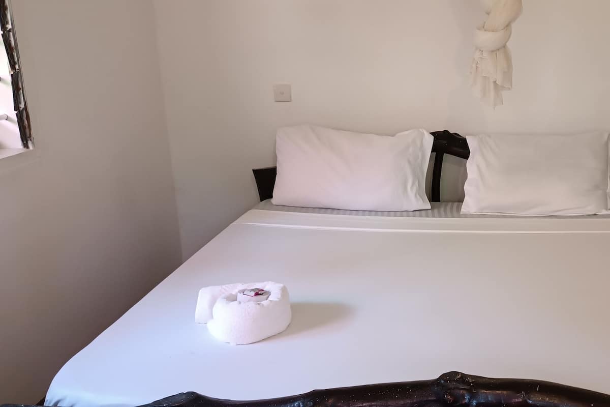Deluxe Double Room, 1 Bedroom, Pool View, Ground Floor | 1 bedroom, desk, free WiFi, bed sheets
