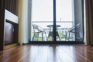 Tomannsrom – deluxe | Oppholdsområde | LCD-TV