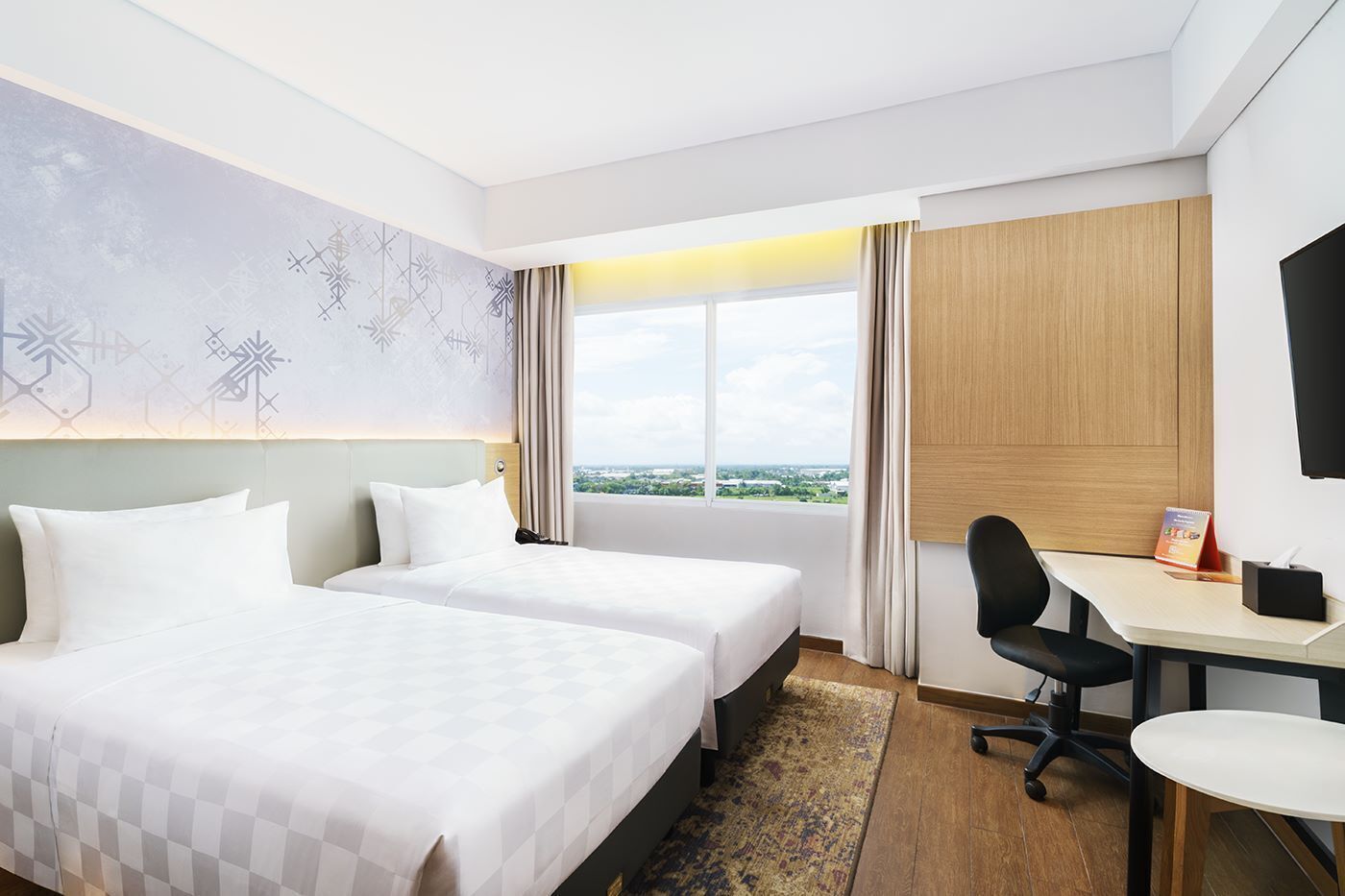 Chambre Deluxe avec lits jumeaux | Minibar, coffre-fort, bureau, système d’insonorisation