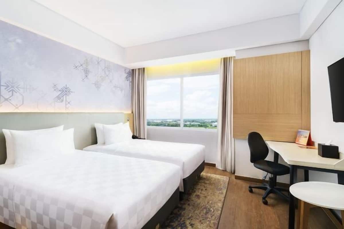 1 slaapkamer, een minibar, een kluis op de kamer, een bureau