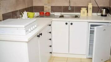 Estúdio | Cozinha privada | Geladeira, cooktop, chaleira elétrica