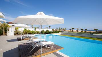 Outdoor pool, pool umbrellas, pool loungers