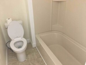Apartment, 2 Bedrooms | Bathroom | Shower, free toiletries, hair dryer, towels