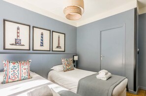 Twin kamer | Een kluis op de kamer, individueel gedecoreerd, individueel gemeubileerd
