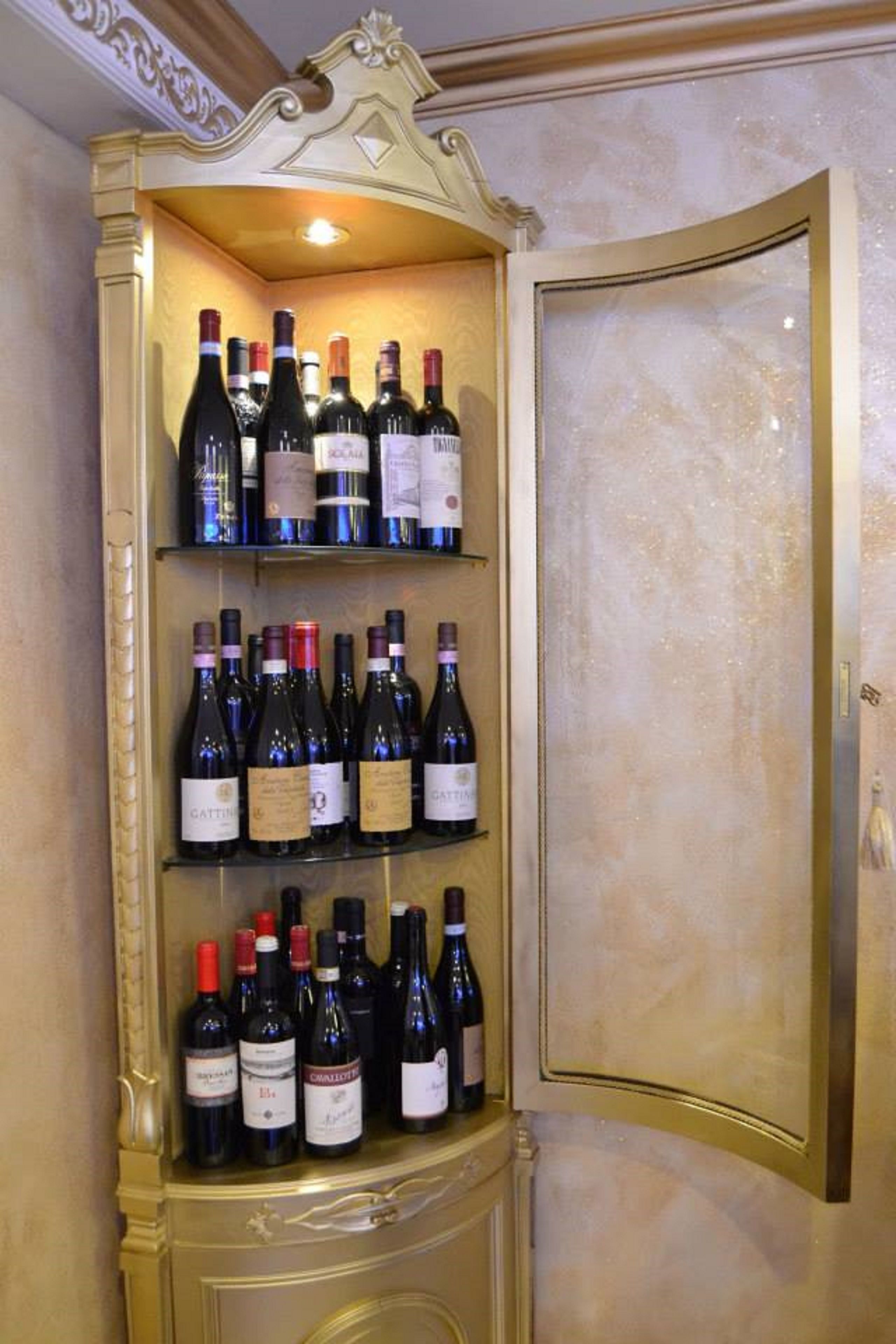 A wine rack with multiple bottles of wine.
