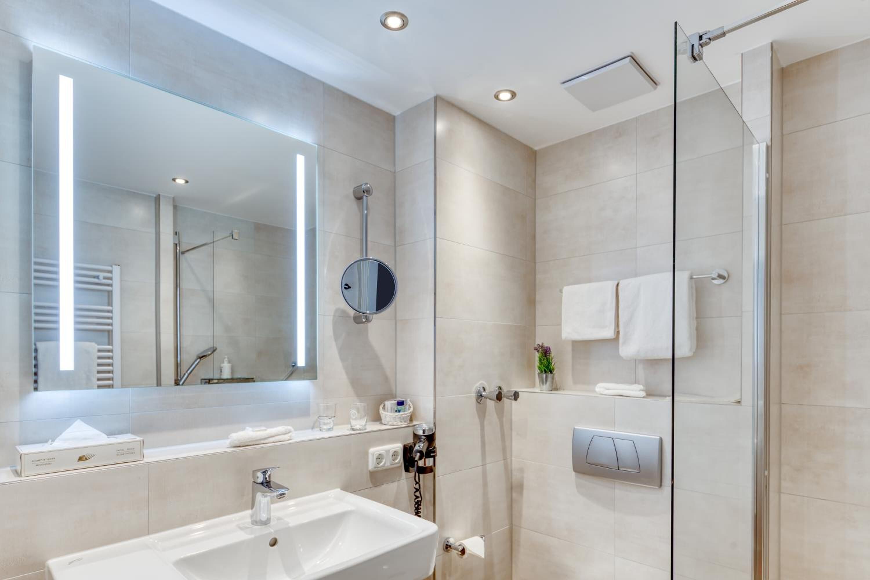 superior double room | bathroom | free toiletries, hair dryer, towels, soap