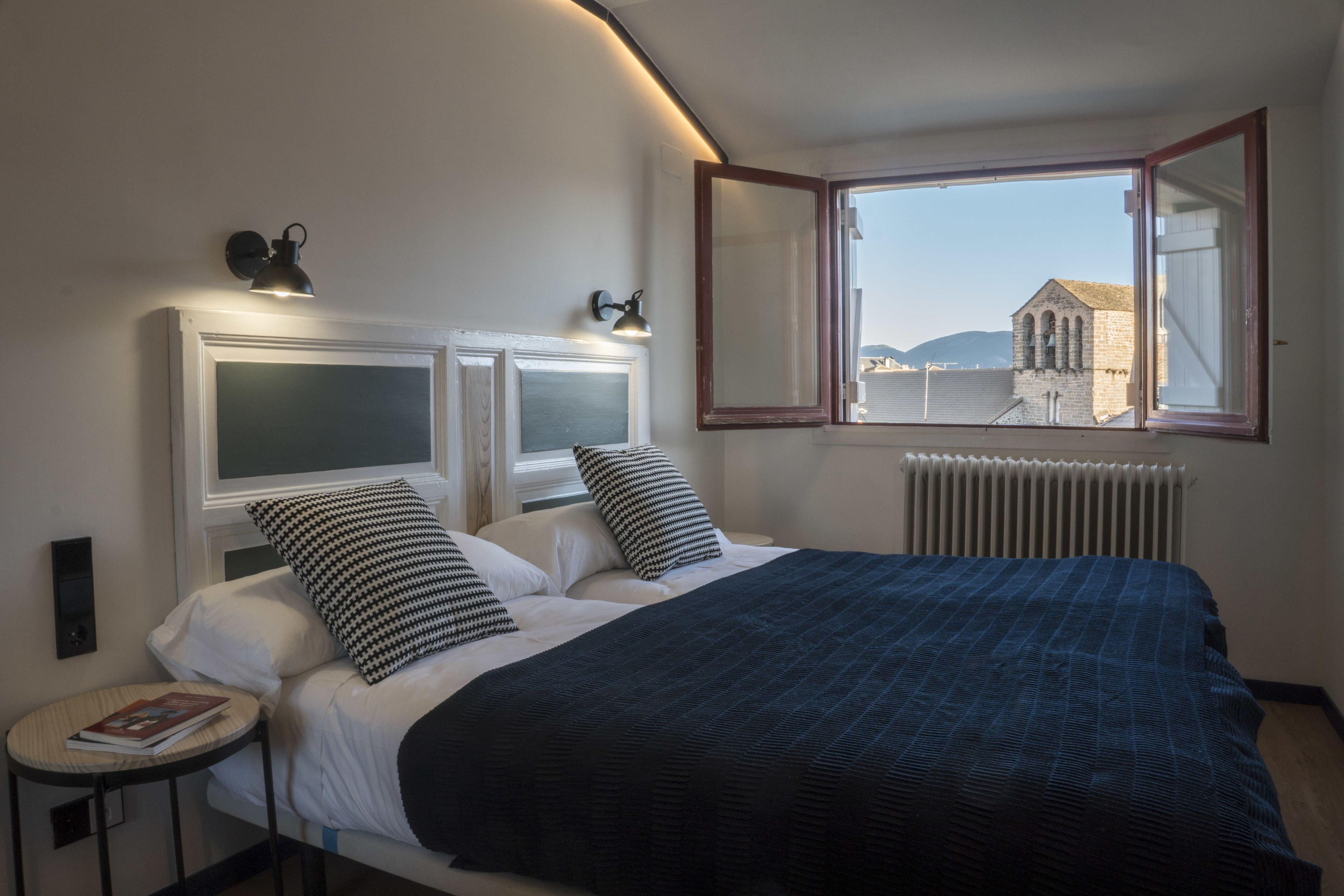 economy double or twin room | premium bedding, down duvets, memory-foam beds, desk