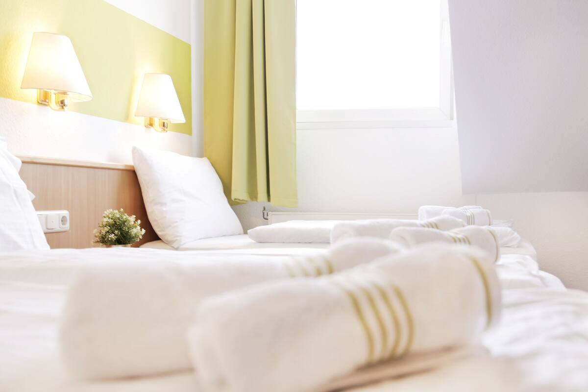 Standard Triple Room | Desk, iron/ironing board (on request), free WiFi, bed sheets