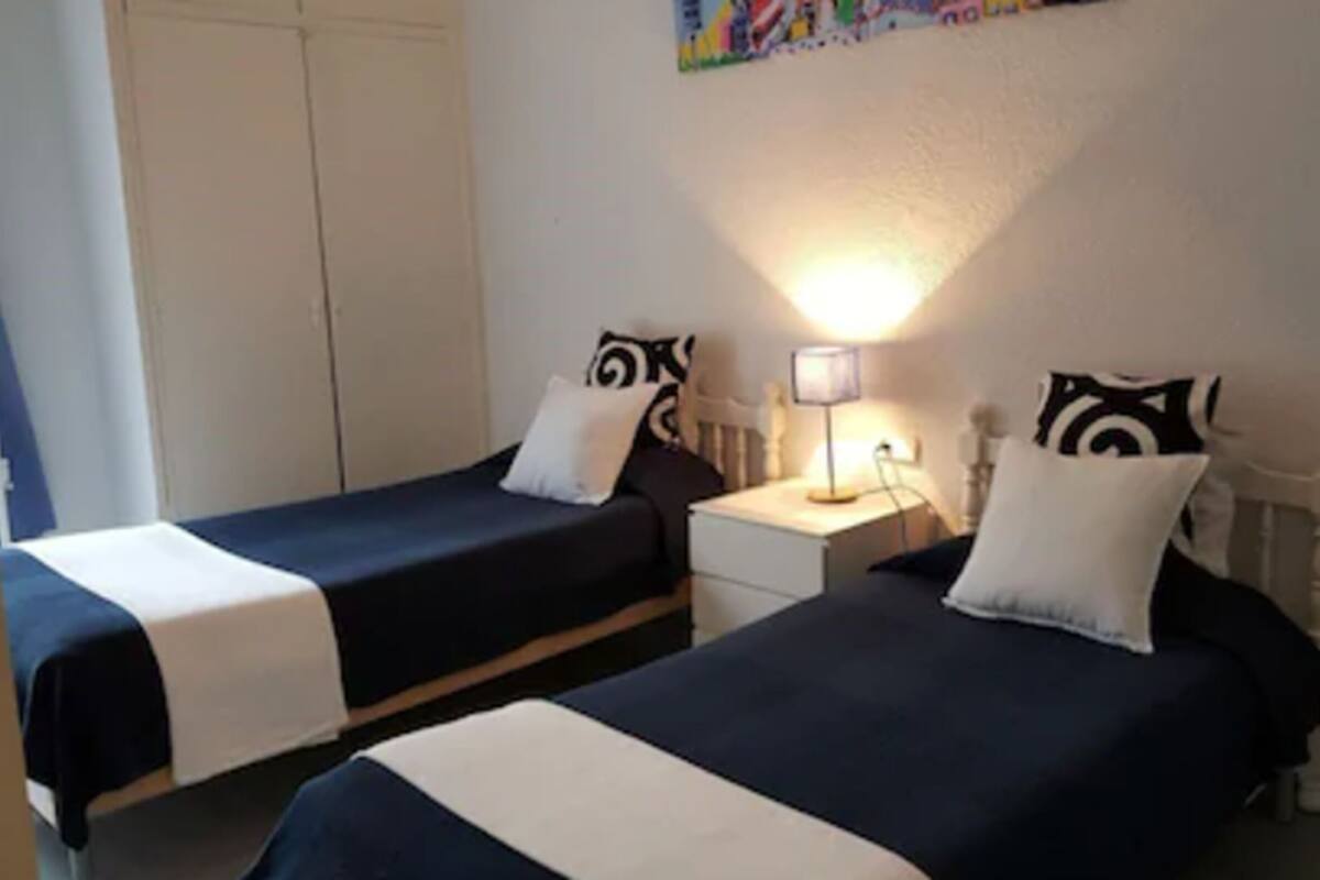 Twin Room, 2 Twin Beds, Shared Bathroom | In-room safe, WiFi (free), bed sheets