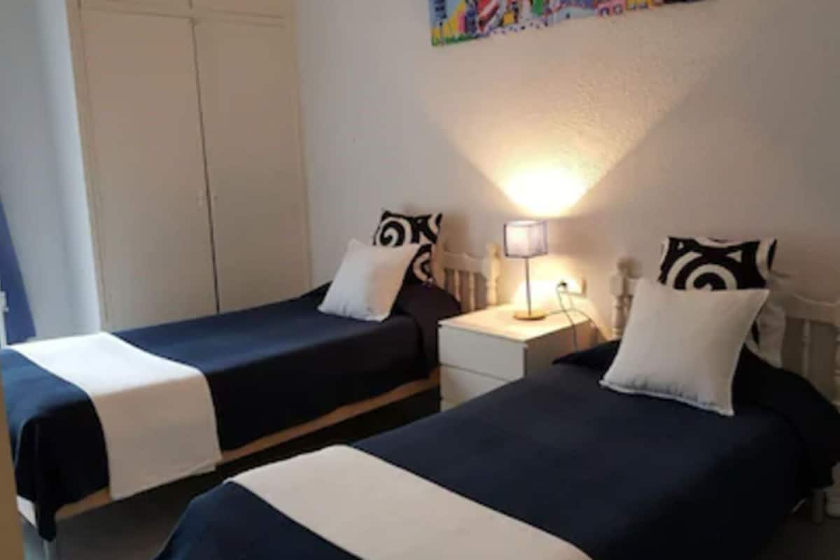 Twin Room, 2 Twin Beds, Shared Bathroom | In-room safe, free WiFi, bed sheets