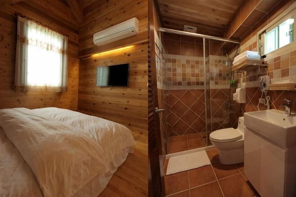 Bathroom | Shower, free toiletries, slippers, towels