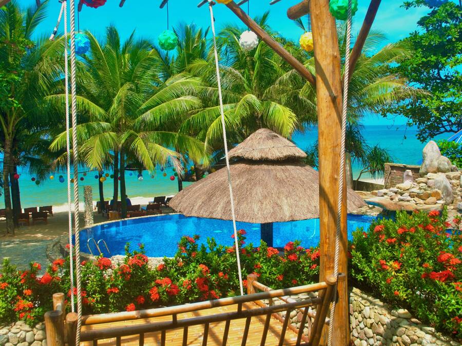 Bungalow – deluxe, sjøutsikt | Minibar (inkludert), safe på rommet, skrivebord og blendingsgardiner