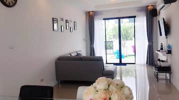 Two Bedrooms Private Pool Villa | Living area | Flat-screen TV