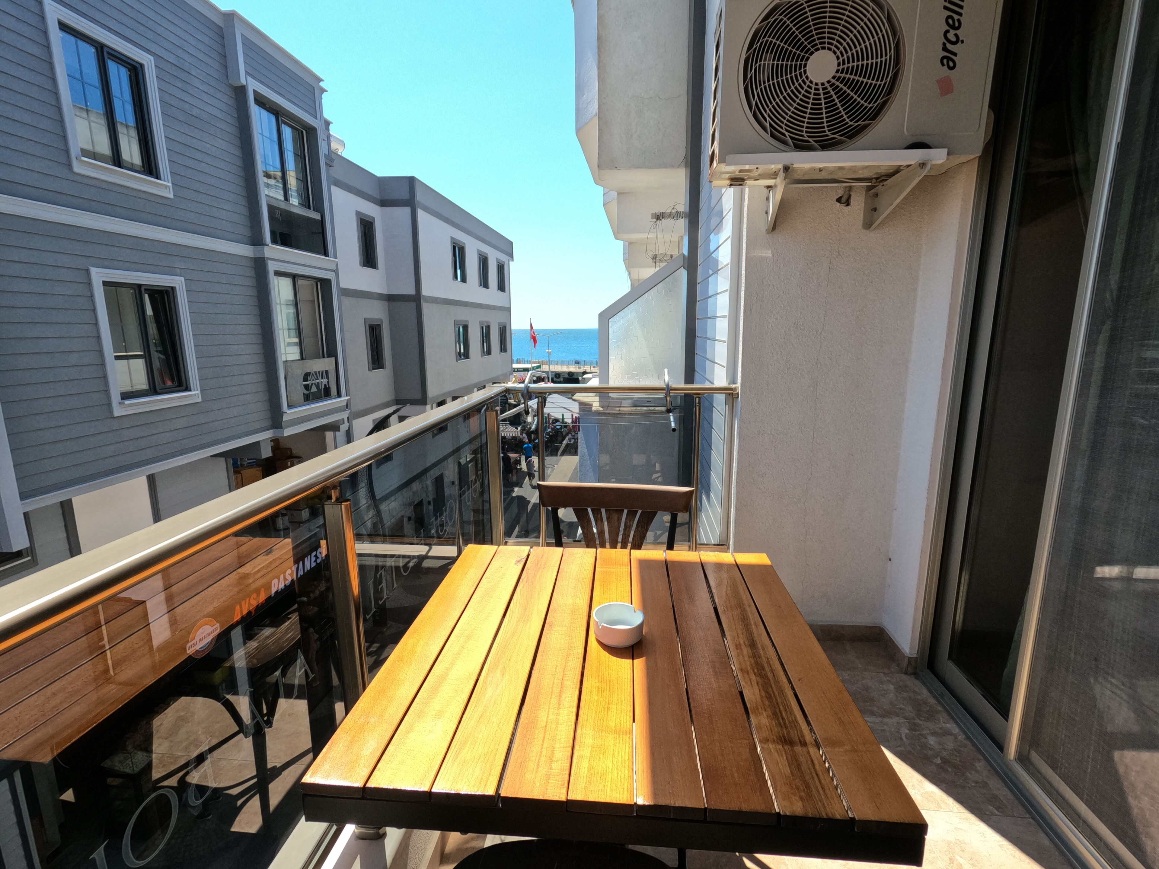 deluxe triple room, partial sea view | beach/ocean view