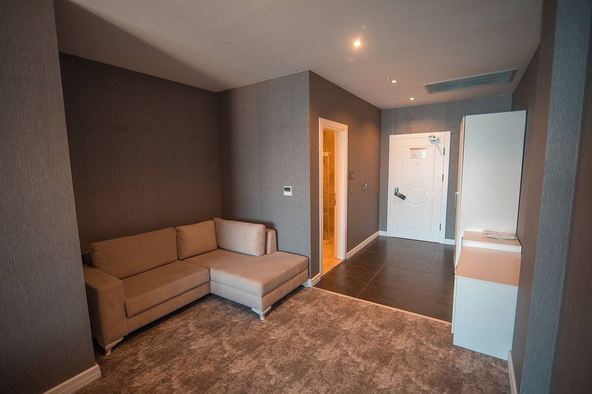 superior room, sea view | minibar, in-room safe, desk, blackout curtains