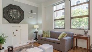 Luxury Apartment, 1 Bedroom | Living room | 32-inch flat-screen TV with premium channels, TV - Murray House Suite (Cape Town)