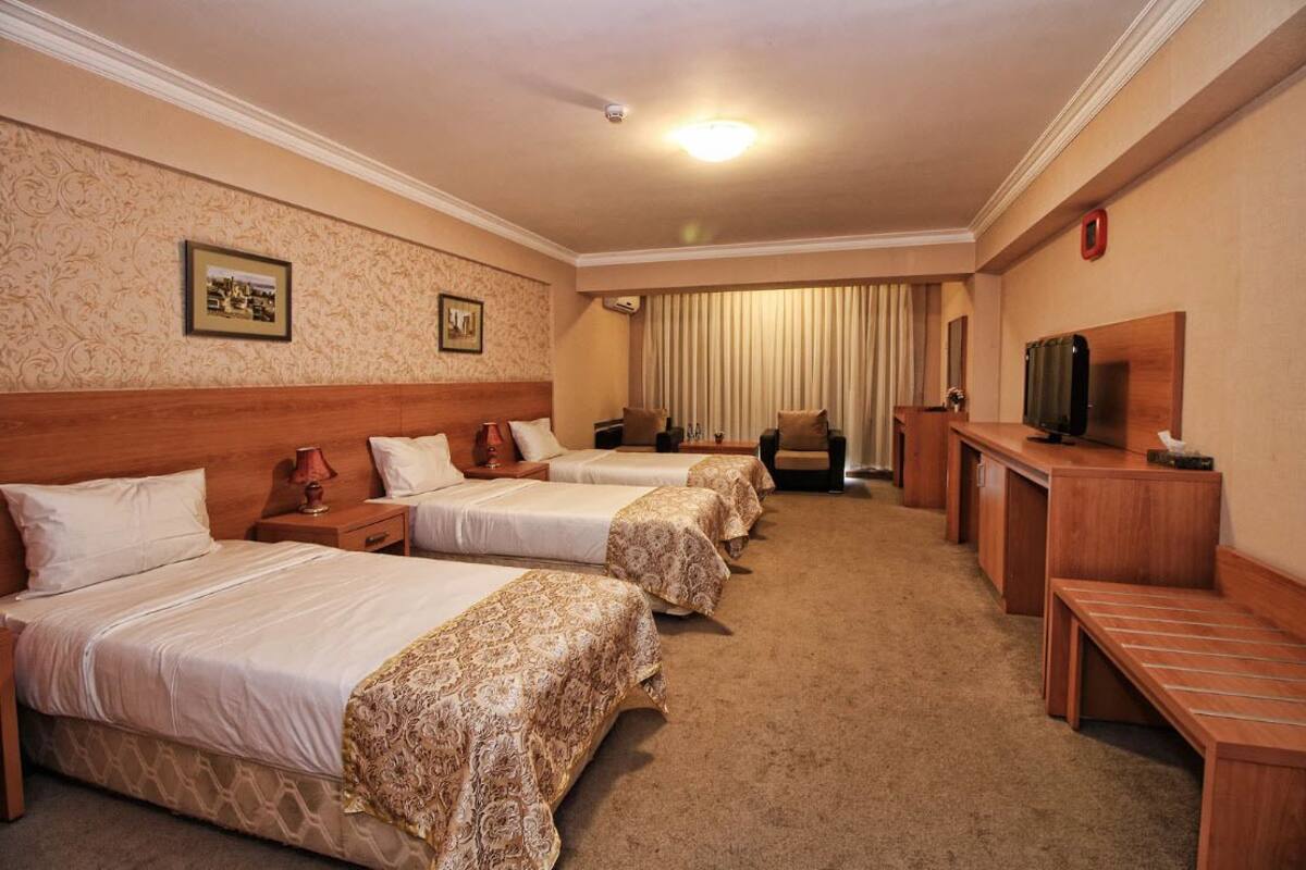 Chambre Triple Standard | Minibar, bureau, lits pliants/supplémentaires, Wi-Fi gratuit