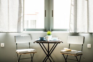 Suite (Nefeli) | Living area | Flat-screen TV