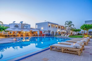 2 outdoor pools, open 9:00 AM to 8:00 PM, pool umbrellas, pool loungers