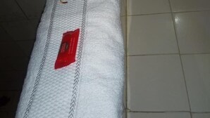 A mattress with a label that reads "Zinnia." - Twiga Sanctuary Resort (Kisumu)
