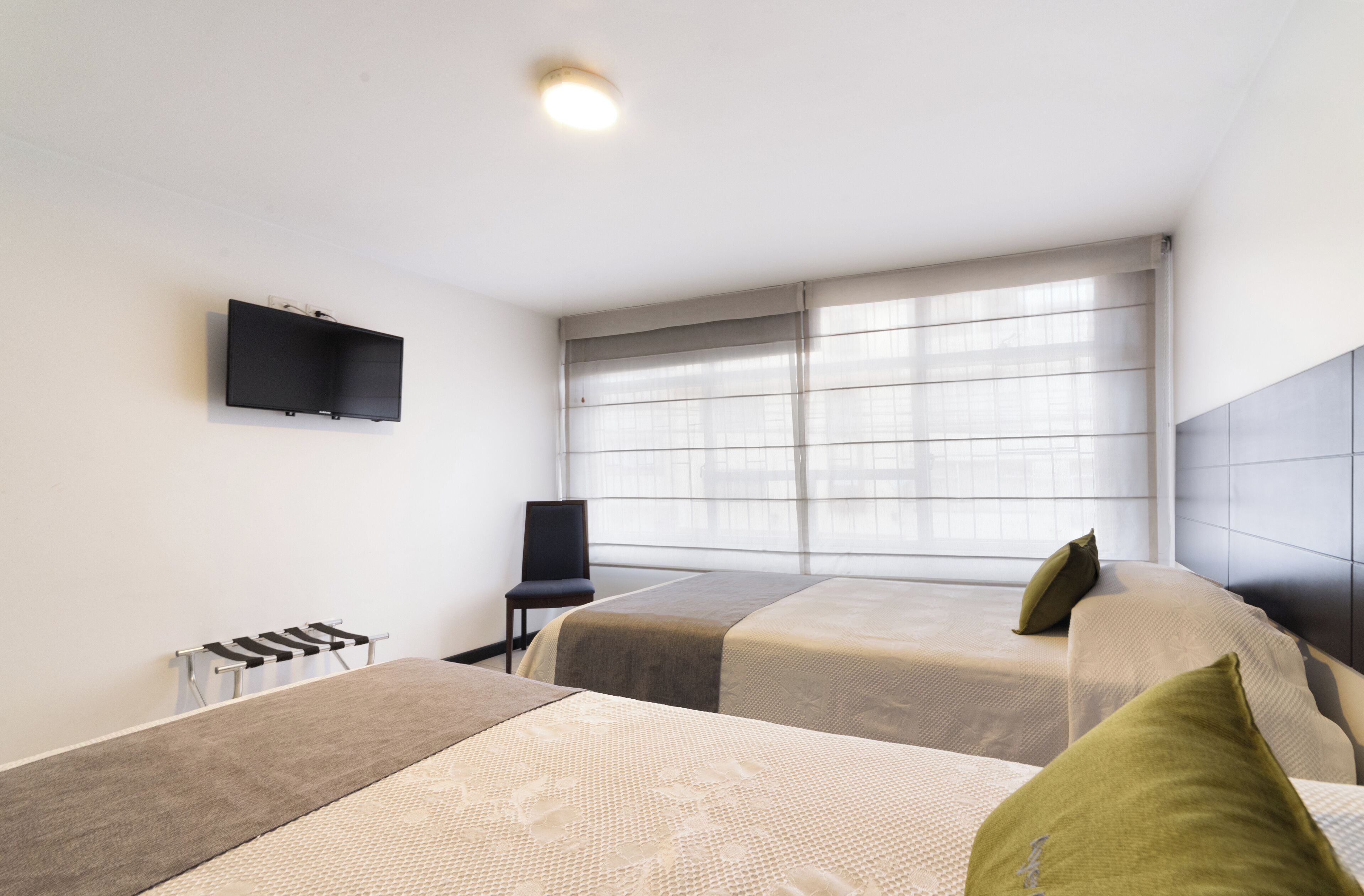 Desk, laptop workspace, free WiFi, bed sheets