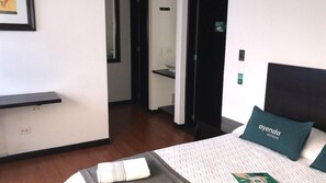 Desk, laptop workspace, free WiFi, bed sheets