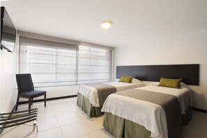 Executive Apartment, Multiple Beds | Desk, laptop workspace, free WiFi, bed sheets