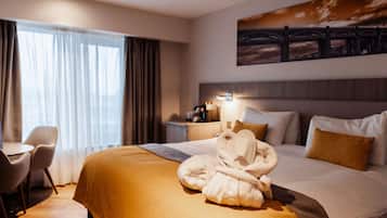 Executive King | Allergitestade sängkläder och värdeförvaringsskåp på rummet