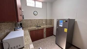 Comfort Apartment, 2 Bedrooms | Private kitchen | Fridge, microwave, oven, stovetop