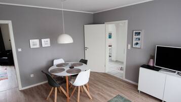 Apartment, 2 Bedrooms | Living area | Flat-screen TV