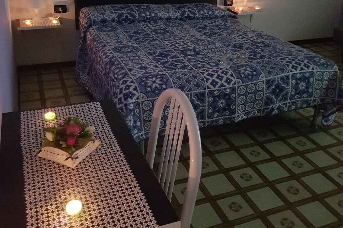 Quarto quádruplo | Cortinas blackout, ferros/tábuas de passar roupa