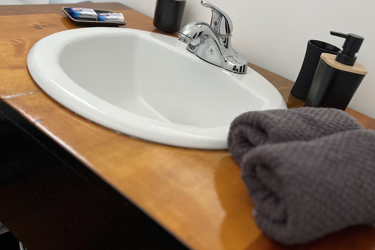 shower, rainfall showerhead, towels, soap