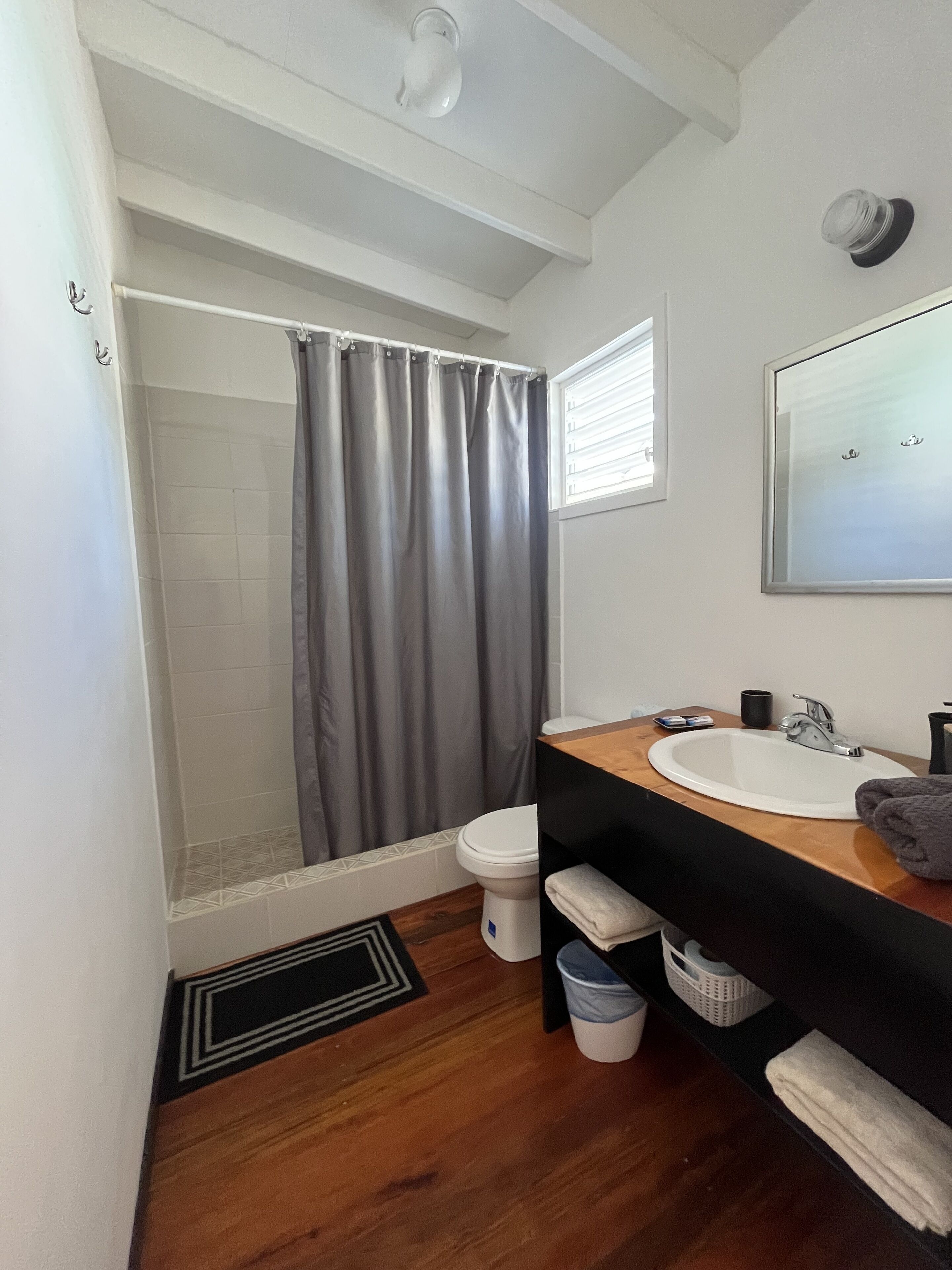 shower, rainfall showerhead, towels, soap