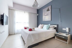 1 bedroom, desk, iron/ironing board, travel cot