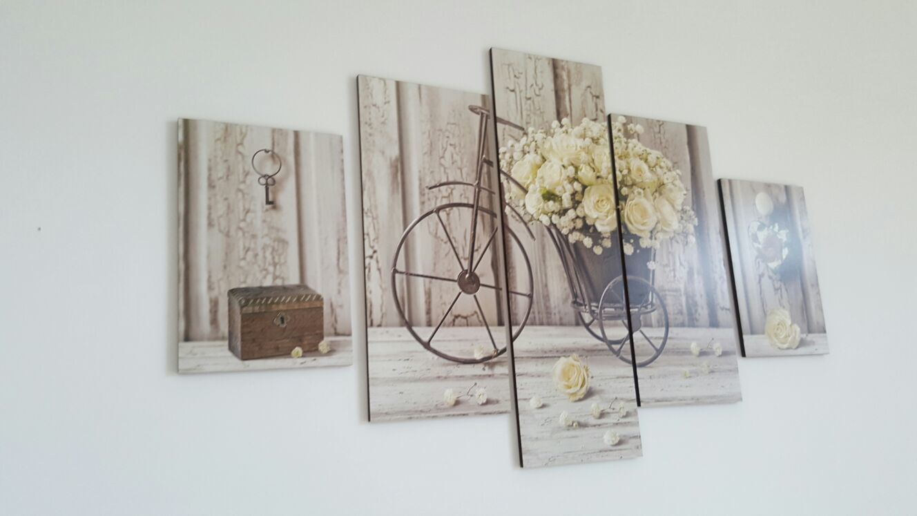A multi-panel artwork featuring a bicycle, flowers, and a vintage chest.