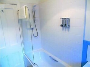 Bathtub, hair dryer, towels