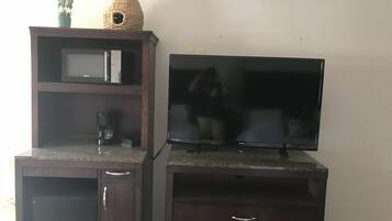 Desk, blackout curtains, soundproofing, iron/ironing board