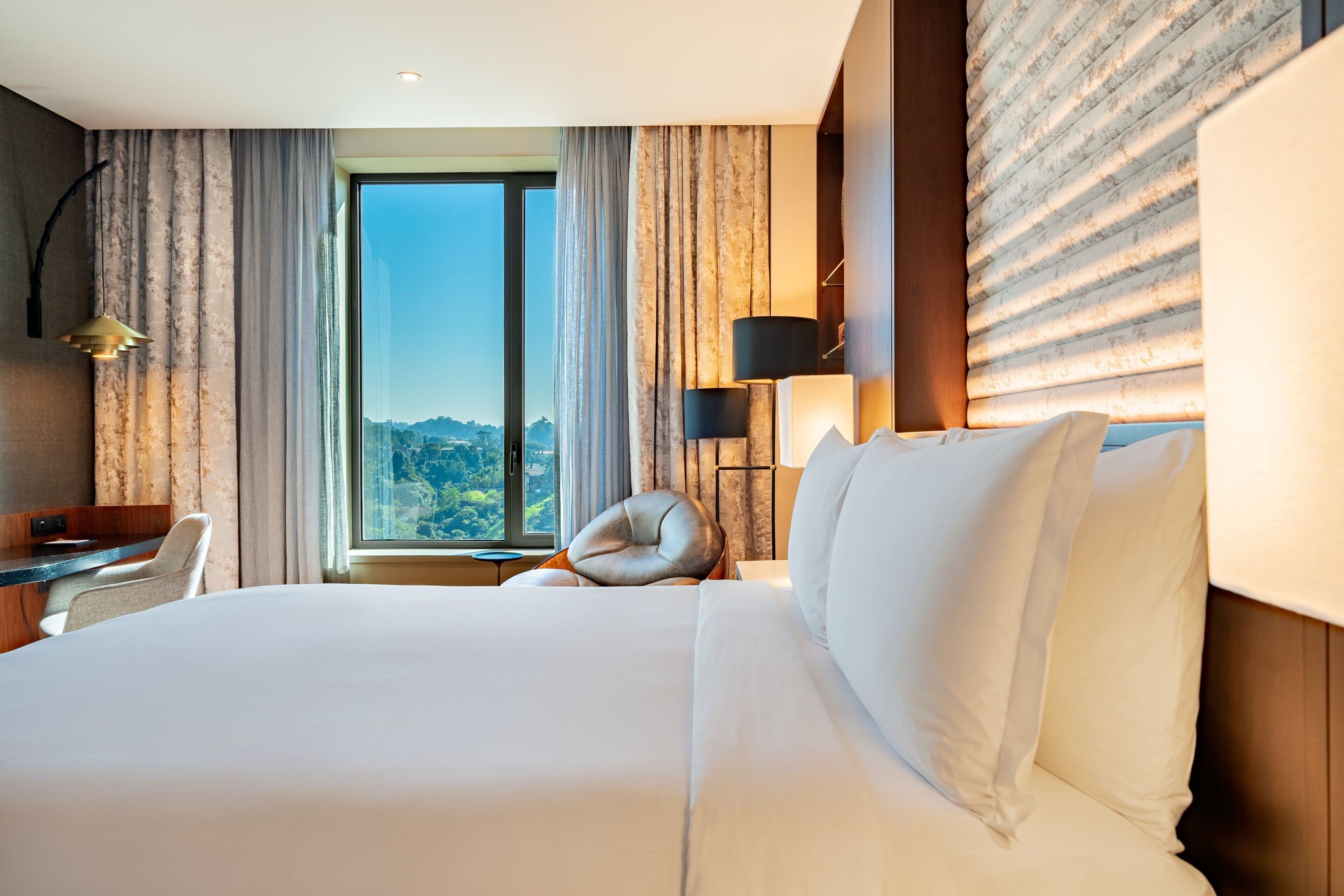 Premium bedding, down duvets, minibar, in-room safe